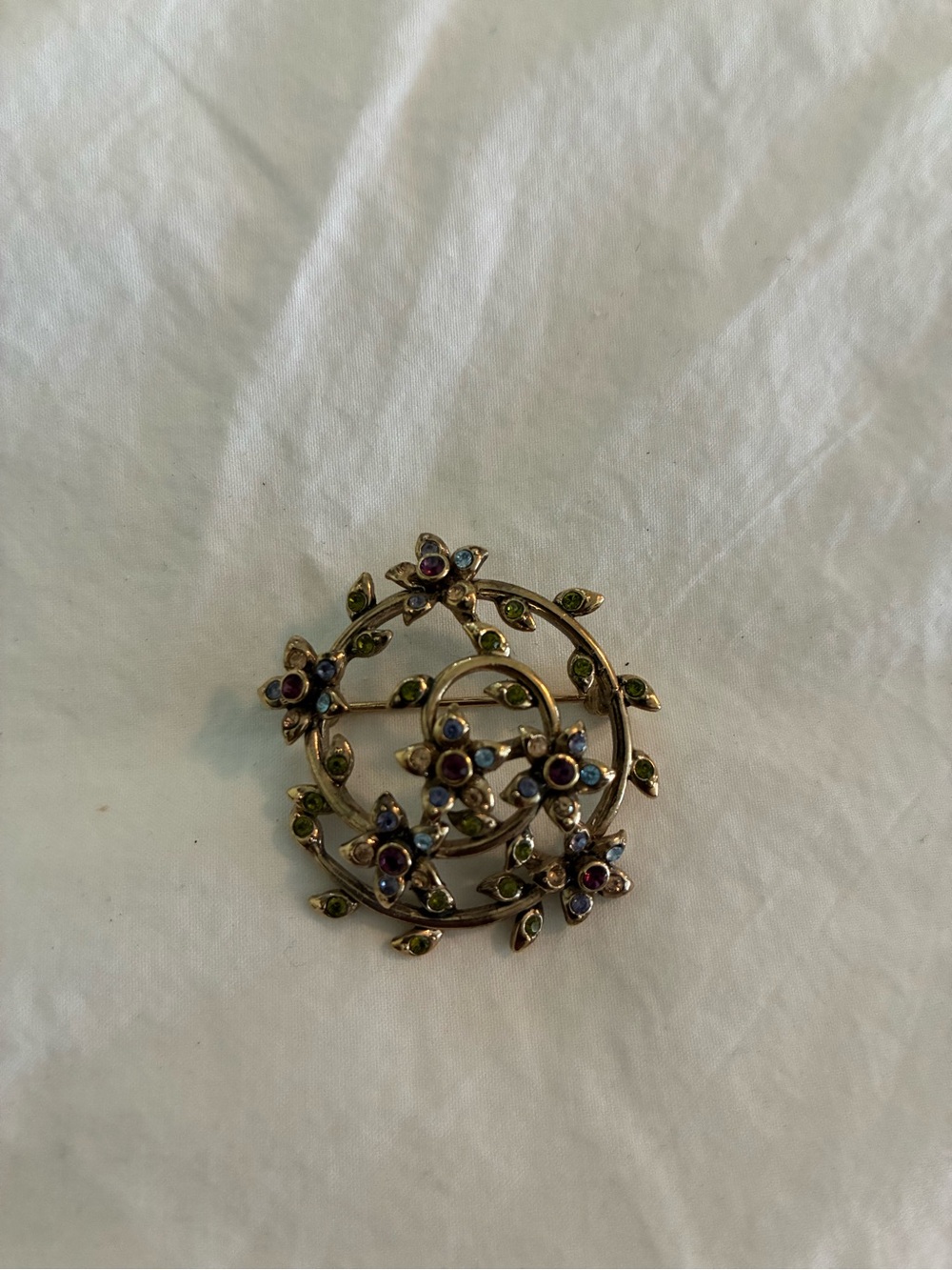 Monet Vintage Gold-Tone Floral Wreath Brooch with Green and Purple Stones